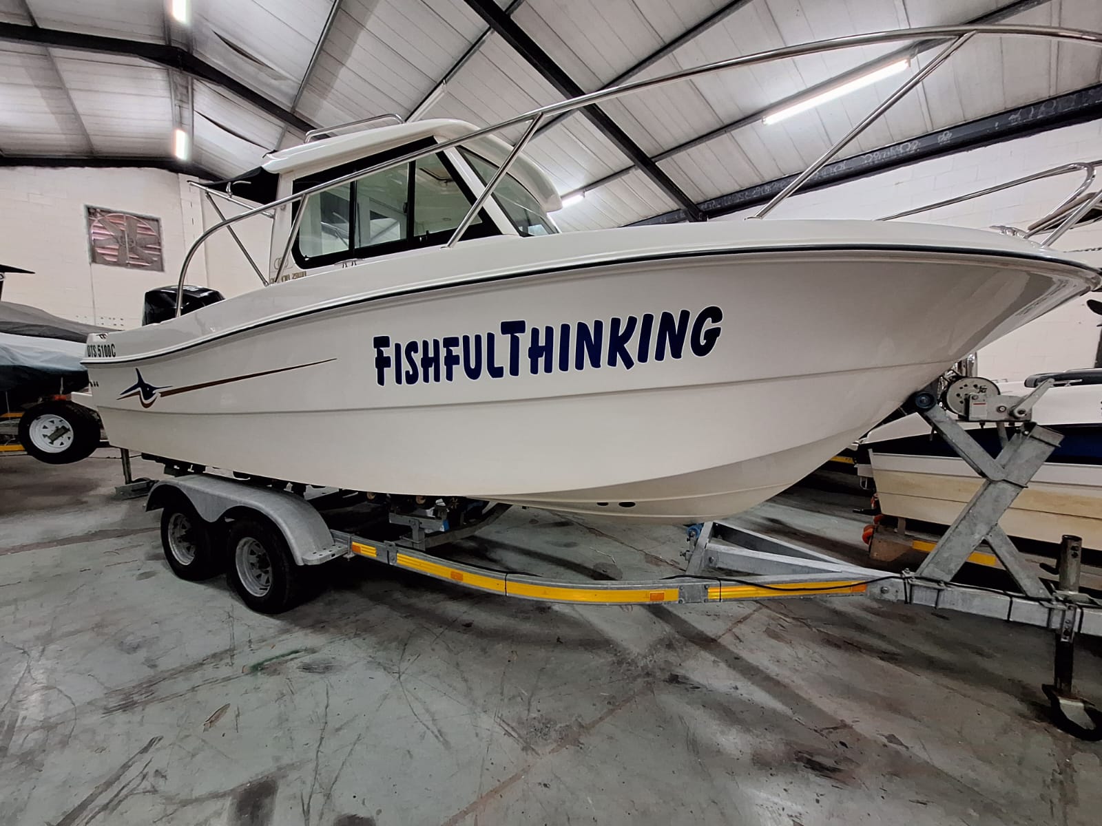 23FT OCEANIA ON TRAILER WITH 200HP MERCURY SEAPRO 4 STROKE
